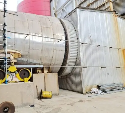 Wear protection for induced draft fan stationary blades